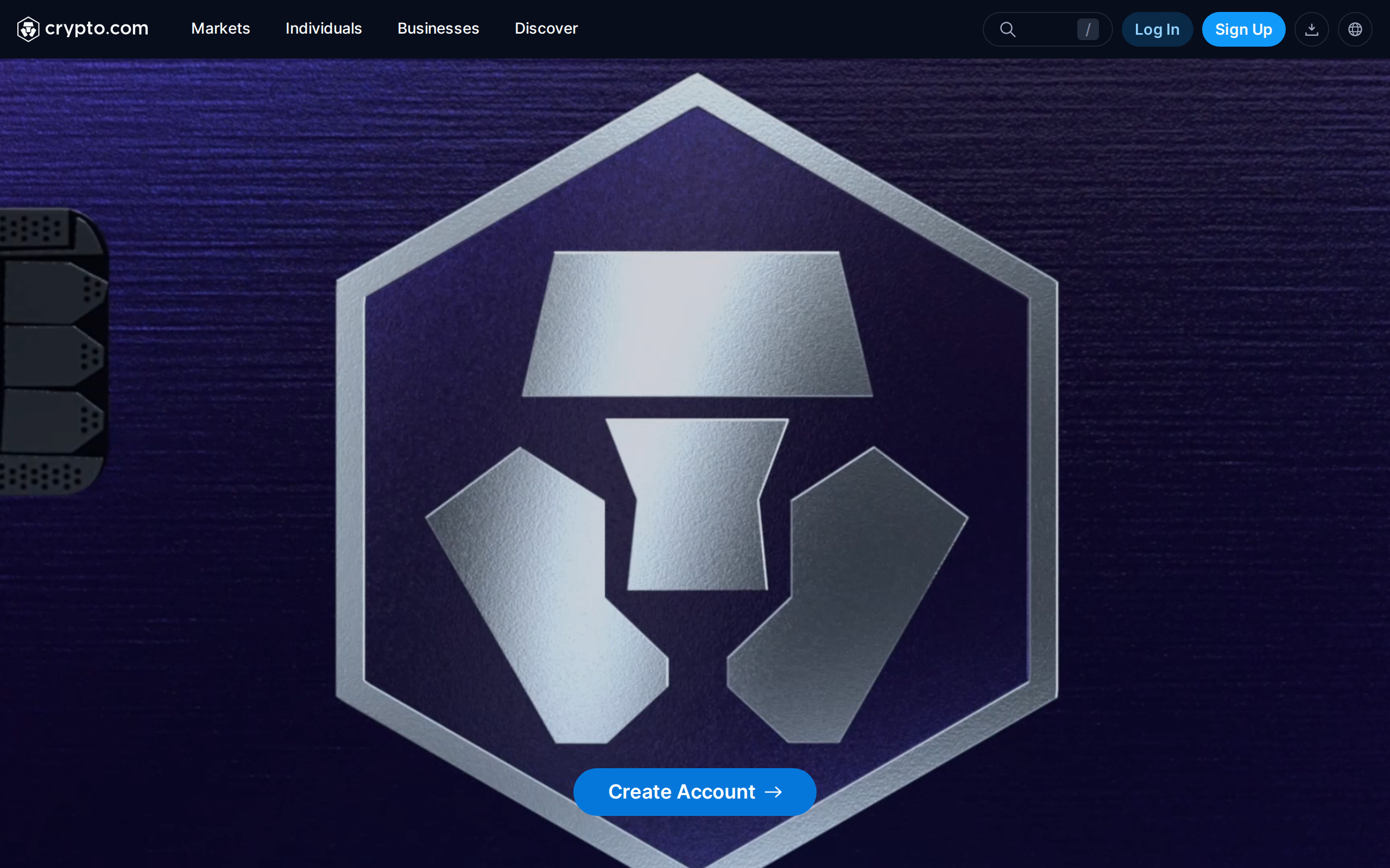 Crypto.com Visa Card page hero art showing the CRO coin logo embossed on a dark card-style background